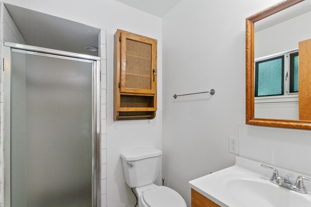 2722 Russell St, Redding, CA 96001 - full bathroom featuring a stall shower, toilet, and vanity