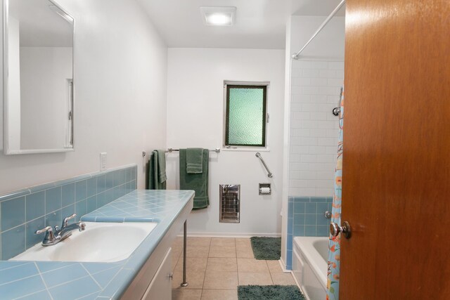 2722 Russell St, Redding, CA 96001 - bathroom with tile patterned floors, vanity, bathtub / shower combination, and baseboards