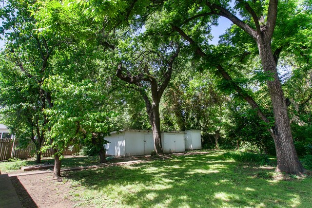 2722 Russell St, Redding, CA 96001 - view of yard featuring an outbuilding and a shed