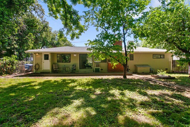 2722 Russell St, Redding, CA 96001 - rear view of house with stucco siding