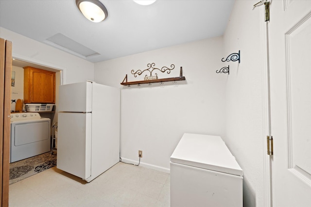37189 Galena Cir, Burney, CA 96013 - washroom featuring washer / dryer, attic access, light flooring, and baseboards