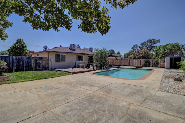5801 Mountain View Dr, Redding, CA 96003 - view of swimming pool with a patio area and a fenced backyard