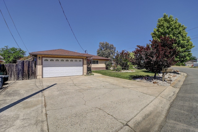 5801 Mountain View Dr, Redding, CA 96003 - single story home with stucco siding, concrete driveway, and an attached garage