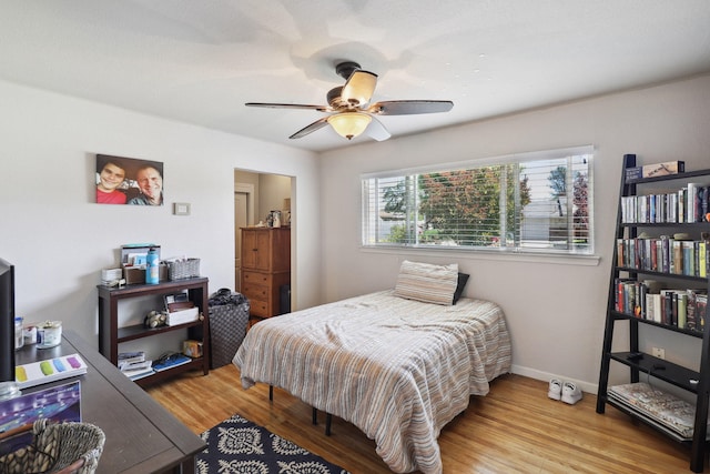 5801 Mountain View Dr, Redding, CA 96003 - bedroom featuring wood finished floors, baseboards, and ceiling fan