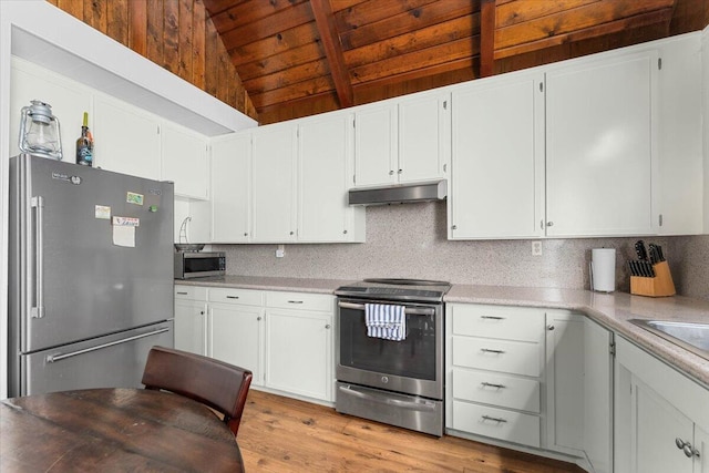 38290 Battle Creek Ave, Mineral, CA 96063 - kitchen featuring appliances with stainless steel finishes, under cabinet range hood, wooden ceiling, light wood-type flooring, and light countertops
