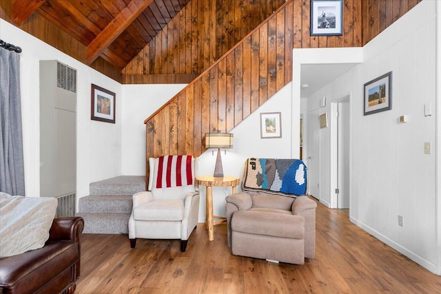 38290 Battle Creek Ave, Mineral, CA 96063 - sitting room with wood ceiling with exposed beams, stairway, wood finished floors, high vaulted ceiling, and a heating unit