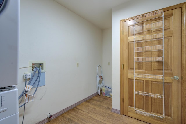 34836 Emigrant Trl, Shingletown, CA 96008 - laundry room with wood finished floors, hookup for a washing machine, and baseboards