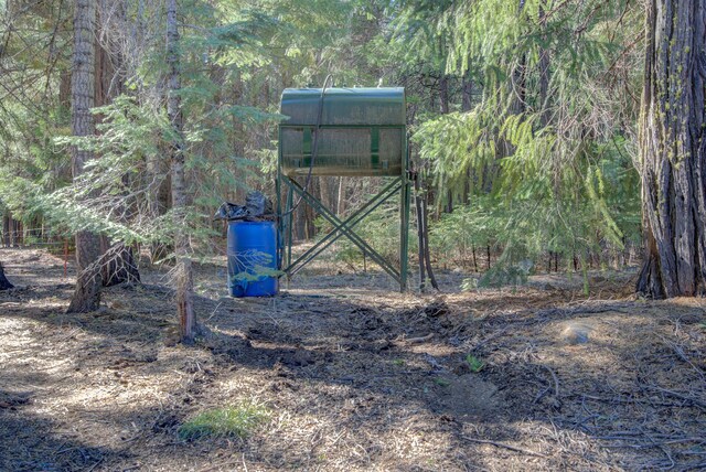 34836 Emigrant Trl, Shingletown, CA 96008 - gate featuring a forest view