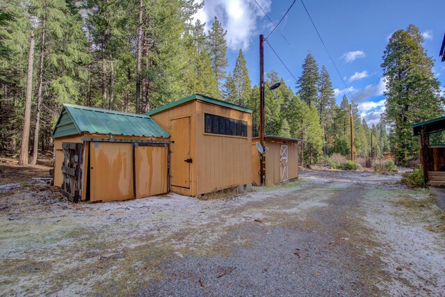 34836 Emigrant Trl, Shingletown, CA 96008 - view of shed featuring a view of trees
