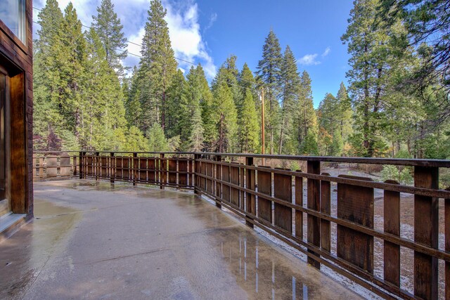 34836 Emigrant Trl, Shingletown, CA 96008 - balcony with a view of trees and a patio