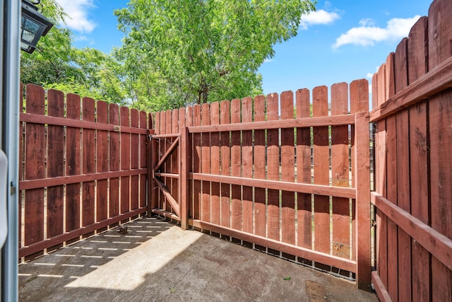 628 Hartnell Ave, Redding, CA 96002 - fenced backyard featuring a patio and a gate