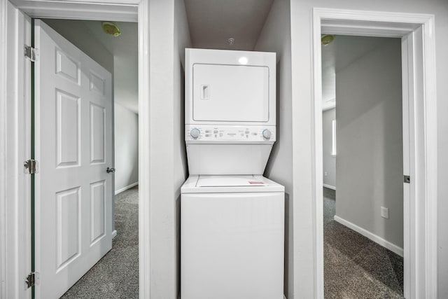 628 Hartnell Ave, Redding, CA 96002 - washroom with stacked washer / dryer, carpet, and baseboards