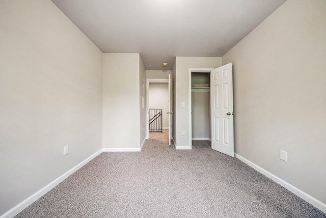 628 Hartnell Ave, Redding, CA 96002 - unfurnished bedroom featuring baseboards, carpet floors, and a closet