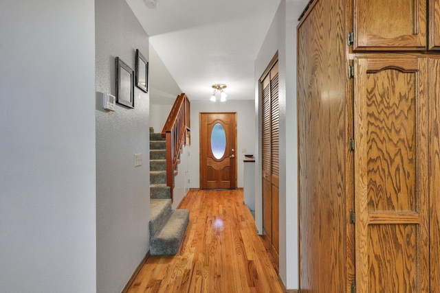 31272 Woodridge Dr, Shingletown, CA 96088 - entryway with light wood-type flooring and stairs