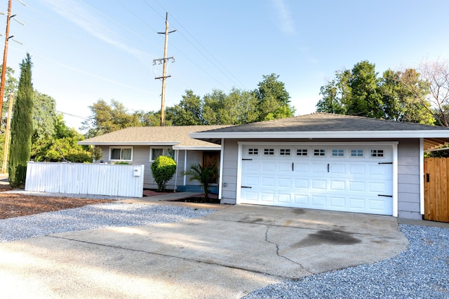 1018 Pineland Dr, Redding, CA 96002 - single story home with a garage, concrete driveway, and a shingled roof