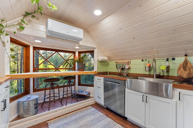 7704 Eastmoore Rd, Shingletown, CA 96088 - kitchen with dishwasher, a wall mounted AC, lofted ceiling, wood ceiling, and a sink