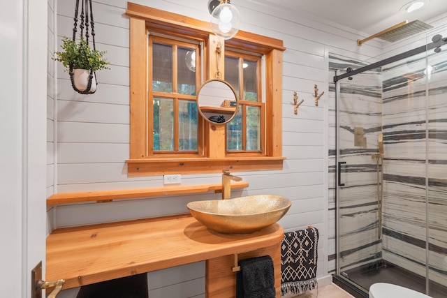 7704 Eastmoore Rd, Shingletown, CA 96088 - full bath with a stall shower, vanity, and wood walls