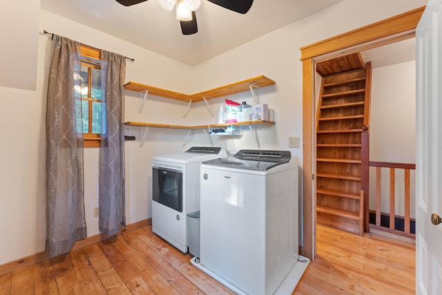 7704 Eastmoore Rd, Shingletown, CA 96088 - laundry area with washing machine and clothes dryer, light wood-style floors, and ceiling fan