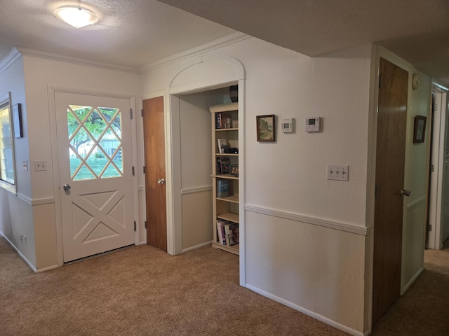 8198 Green Acres Ln, Redding, CA 96002 - carpeted entrance foyer featuring crown molding and baseboards