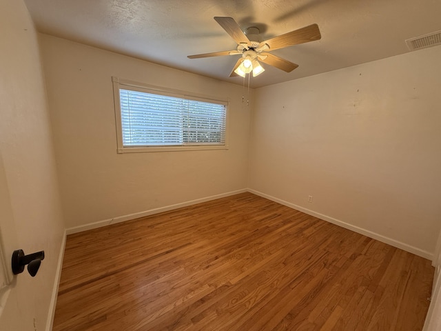 1434 Jeffries Ave, Anderson, CA 96007 - unfurnished room featuring wood finished floors, baseboards, and ceiling fan