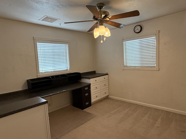 1434 Jeffries Ave, Anderson, CA 96007 - unfurnished office featuring healthy amount of natural light, ceiling fan, light colored carpet, and baseboards