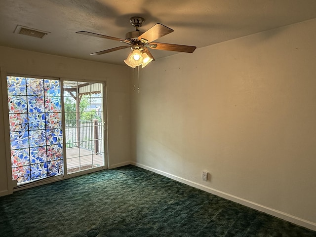 1434 Jeffries Ave, Anderson, CA 96007 - unfurnished room featuring dark carpet, baseboards, and ceiling fan