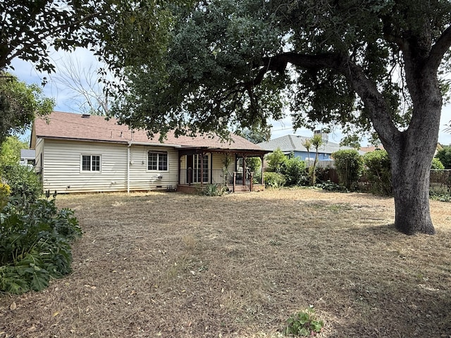 1434 Jeffries Ave, Anderson, CA 96007 - back of house with covered porch and fence