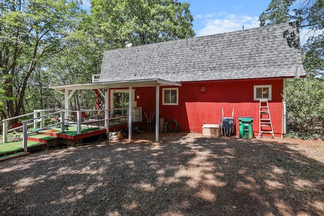 7372 Tahoe Ln, Shingletown, CA 96088 - back of house with roof with shingles and a deck