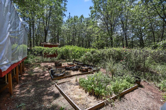 7372 Tahoe Ln, Shingletown, CA 96088 - view of yard featuring a garden