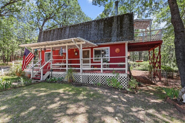 7372 Tahoe Ln, Shingletown, CA 96088 - view of front of house featuring a wooden deck