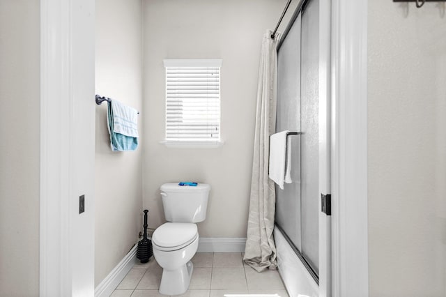 22540 Brady Ct, Red Bluff, CA 96080 - full bath with toilet, curtained shower, tile patterned flooring, and baseboards