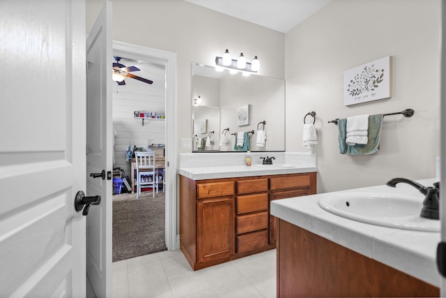 22540 Brady Ct, Red Bluff, CA 96080 - bathroom featuring two vanities, ceiling fan, and tile patterned floors