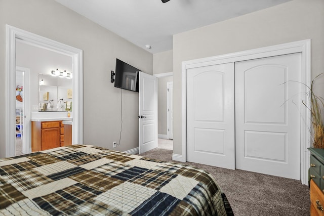 22540 Brady Ct, Red Bluff, CA 96080 - carpeted bedroom featuring a closet, ensuite bathroom, and baseboards