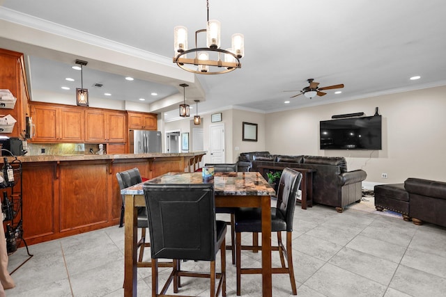 22540 Brady Ct, Red Bluff, CA 96080 - dining room featuring a ceiling fan, a chandelier, crown molding, recessed lighting, and baseboards