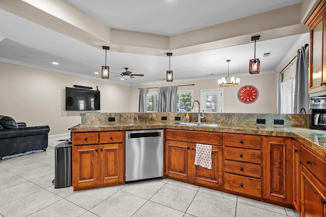 22540 Brady Ct, Red Bluff, CA 96080 - kitchen featuring dishwasher, tile countertops, a sink, brown cabinetry, and hanging light fixtures