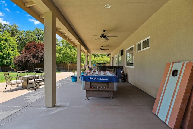 22540 Brady Ct, Red Bluff, CA 96080 - fenced backyard with a patio area, ceiling fan, and outdoor dining space