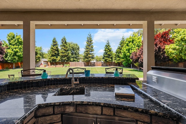 22540 Brady Ct, Red Bluff, CA 96080 - view of patio with a sink and an outdoor kitchen