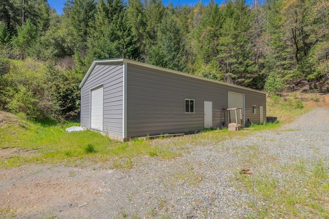 8916 Reading Creek Rd, Douglas City, CA 96024 - view of outdoor structure featuring a wooded view