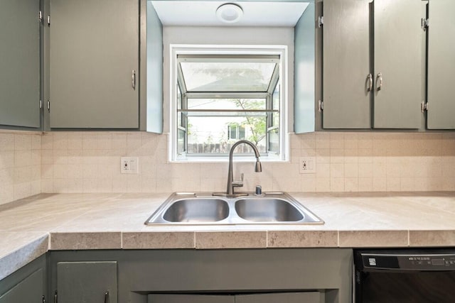 1640 Wisconsin Ave, Redding, CA 96001 - kitchen featuring a sink, black dishwasher, light countertops, and tasteful backsplash