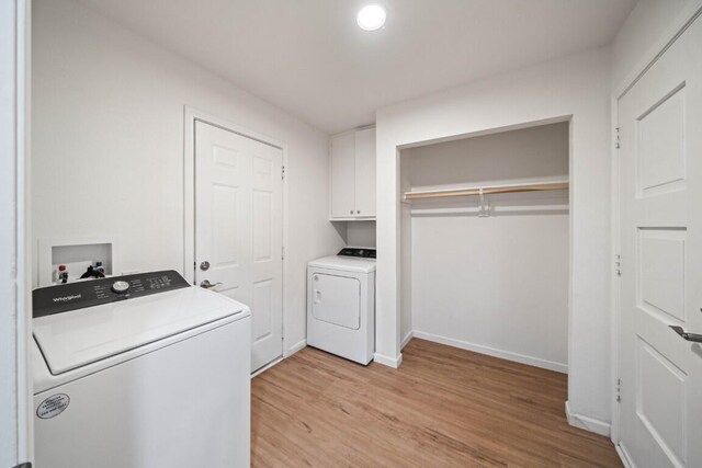 1640 Wisconsin Ave, Redding, CA 96001 - washroom with cabinet space, light wood-type flooring, hookup for a washing machine, and baseboards