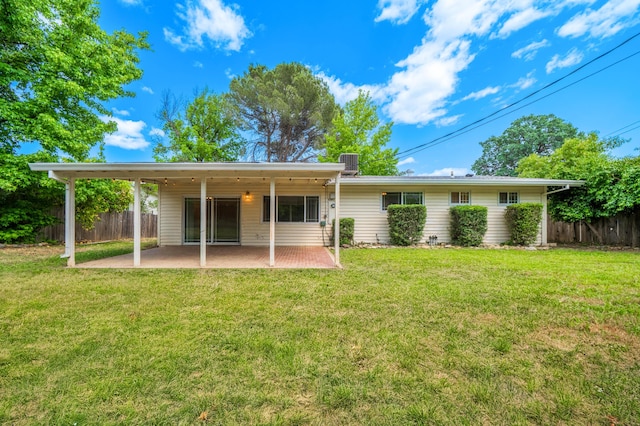 1640 Wisconsin Ave, Redding, CA 96001 - back of house featuring a patio area and central AC unit