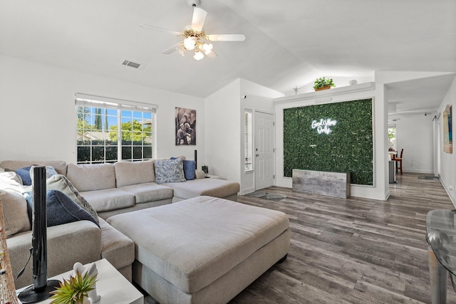 910 Montcrest Dr, Redding, CA 96003 - living area with vaulted ceiling, wood finished floors, ceiling fan, and baseboards