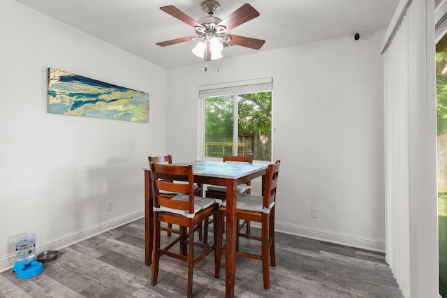 910 Montcrest Dr, Redding, CA 96003 - dining area featuring baseboards, wood finished floors, and a ceiling fan