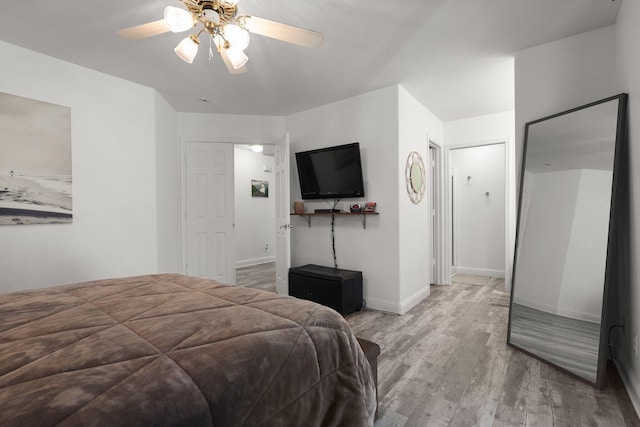 910 Montcrest Dr, Redding, CA 96003 - bedroom featuring wood finished floors, baseboards, and ceiling fan