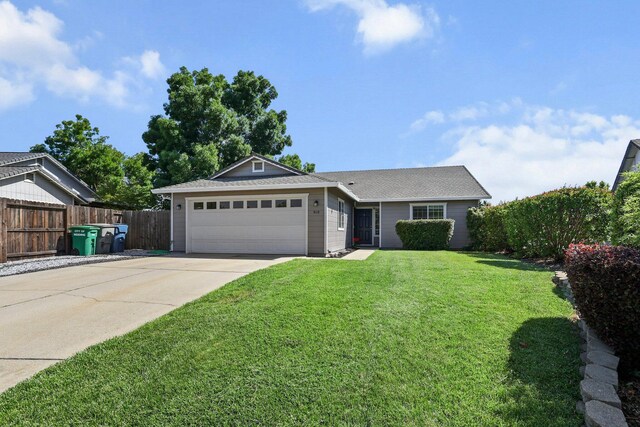 910 Montcrest Dr, Redding, CA 96003 - ranch-style home featuring an attached garage, driveway, and roof with shingles