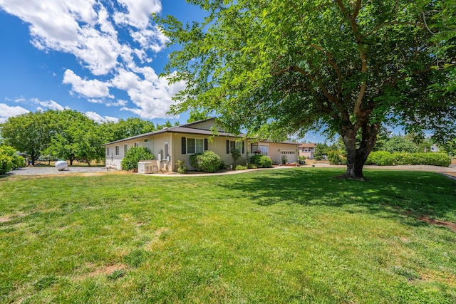 6766 Drake Dr, Anderson, CA 96007 - ranch-style house with a front yard and a garage
