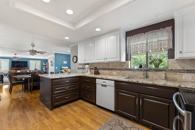 6766 Drake Dr, Anderson, CA 96007 - kitchen featuring dishwasher, dark brown cabinetry, stainless steel electric range oven, a sink, and white cabinetry