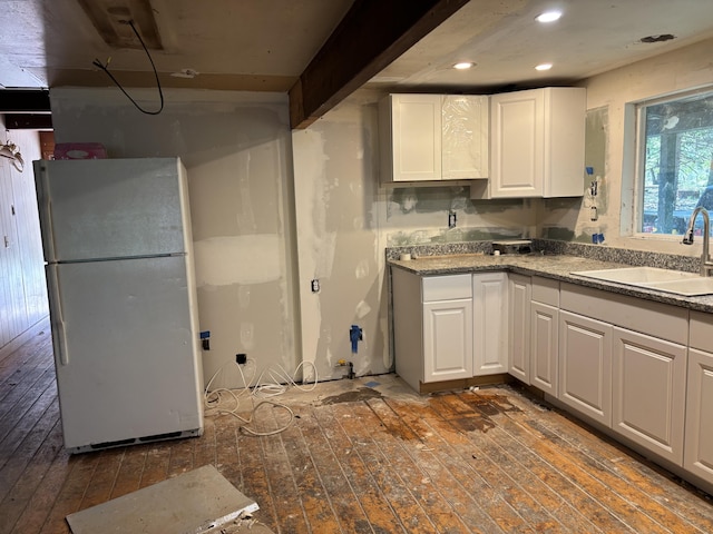 10473 Blue Mountain Ranch Rd, Whitmore, CA 96096 - kitchen featuring freestanding refrigerator, dark wood-type flooring, a sink, white cabinets, and recessed lighting