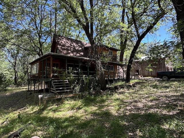 10473 Blue Mountain Ranch Rd, Whitmore, CA 96096 - back of property with stairway and a wooden deck