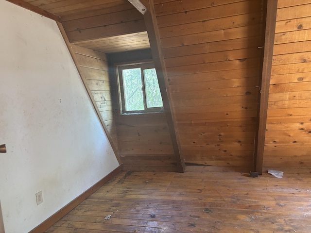 10473 Blue Mountain Ranch Rd, Whitmore, CA 96096 - unfurnished room featuring wood ceiling, hardwood / wood-style floors, wood walls, and baseboards